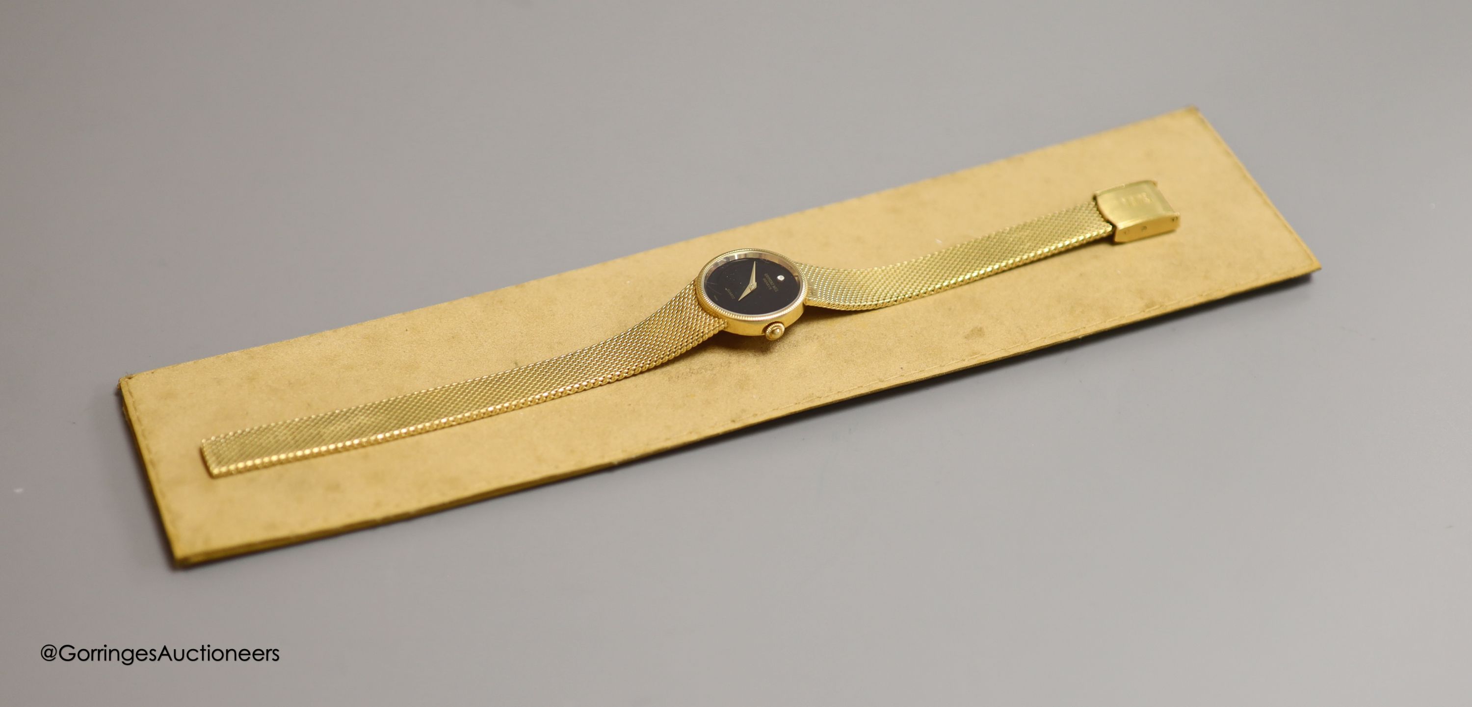 A lady's 18k gold electroplated Raymond Weil quartz wrist watch, overall 20.7cm, with Raymond Weil pouch.
